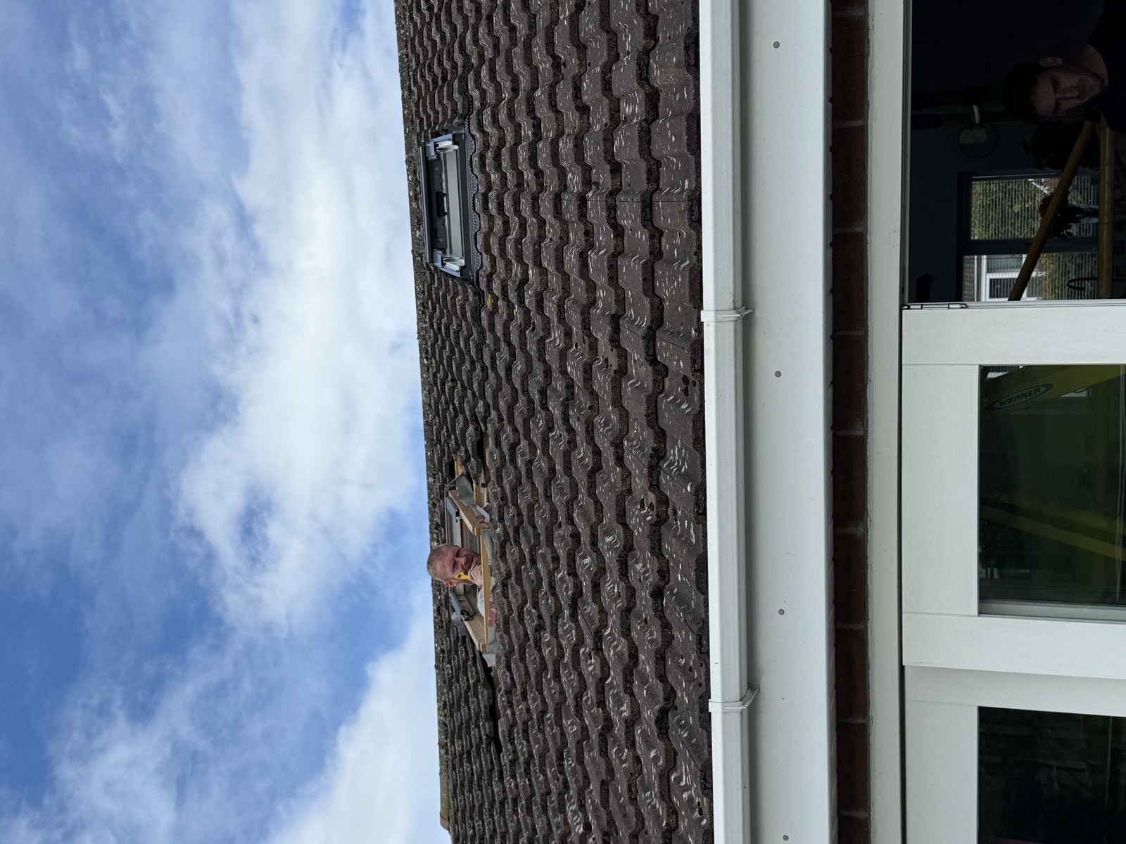 External view of existing FAKRO roof windows before VELUX replacement