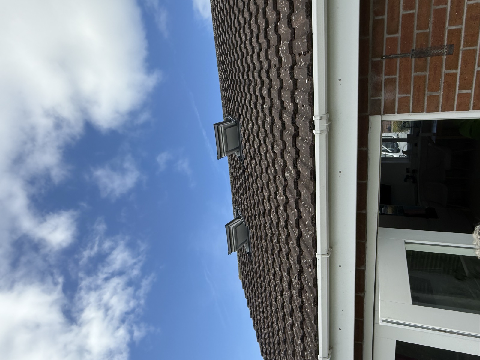 Two solar-operated VELUX roof windows with solar blinds installed in Knutsford