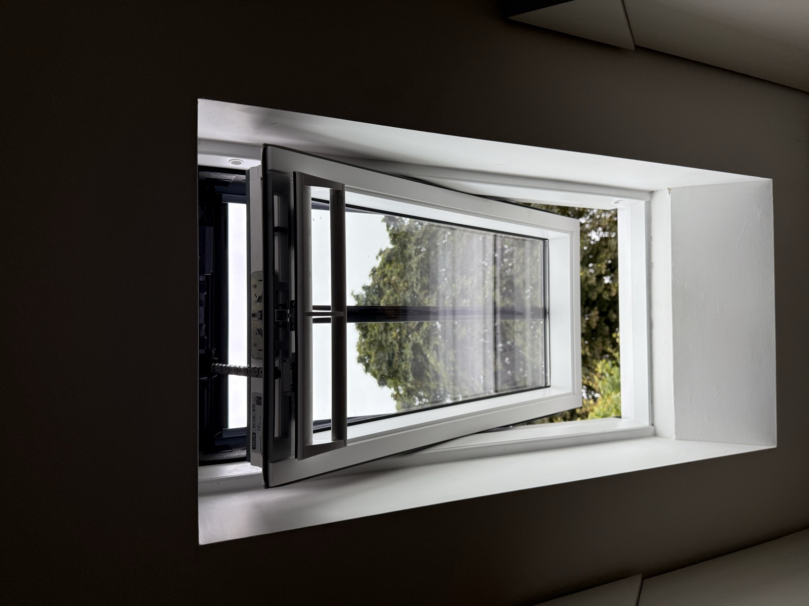 VELUX EDL CK04 slate flashing installed around a conservation window